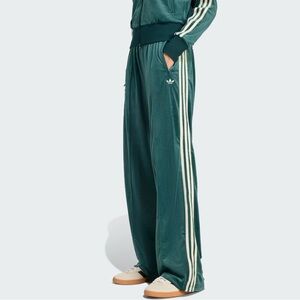 Adidas women’s green velvet track pants with White Stripes